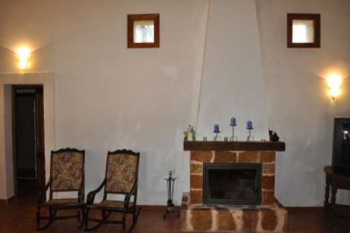 Finca Algarroba, Schaukelstuhl, Kamin