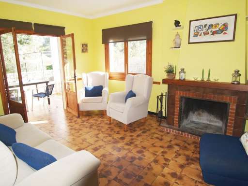 Casa Pina, Wohnzimmer, Sessel, Sofa, Kamin