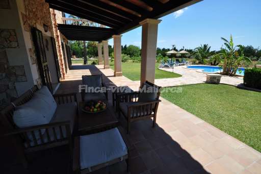 Casa Maria Cala Sanau, überdachte Terrasse, Garten, Sitzmöglichkeit, Lounge