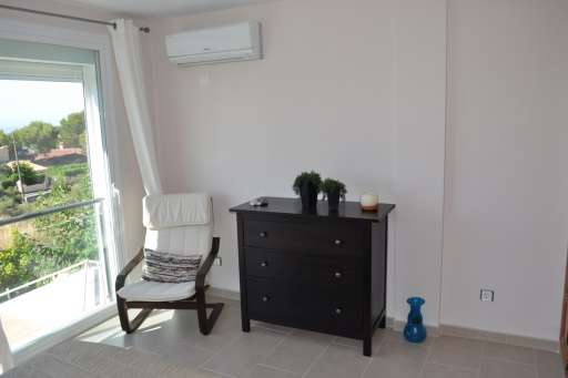 Chalet Cala Pi, Schlafzimmer, Sessel, Kommode